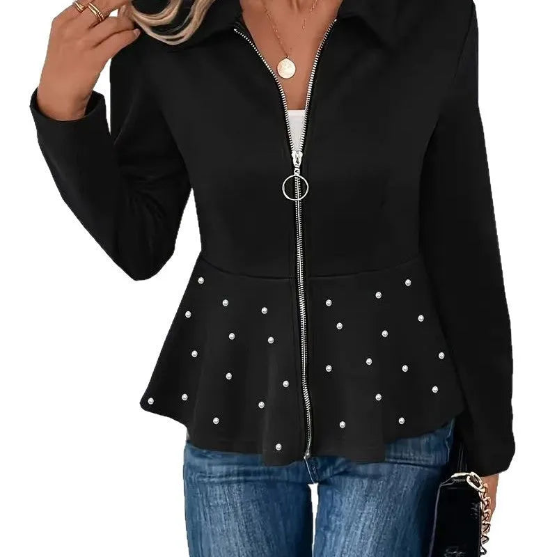 Women's black loose fit coat with a ruffled hem and a heavy-duty front zipper.