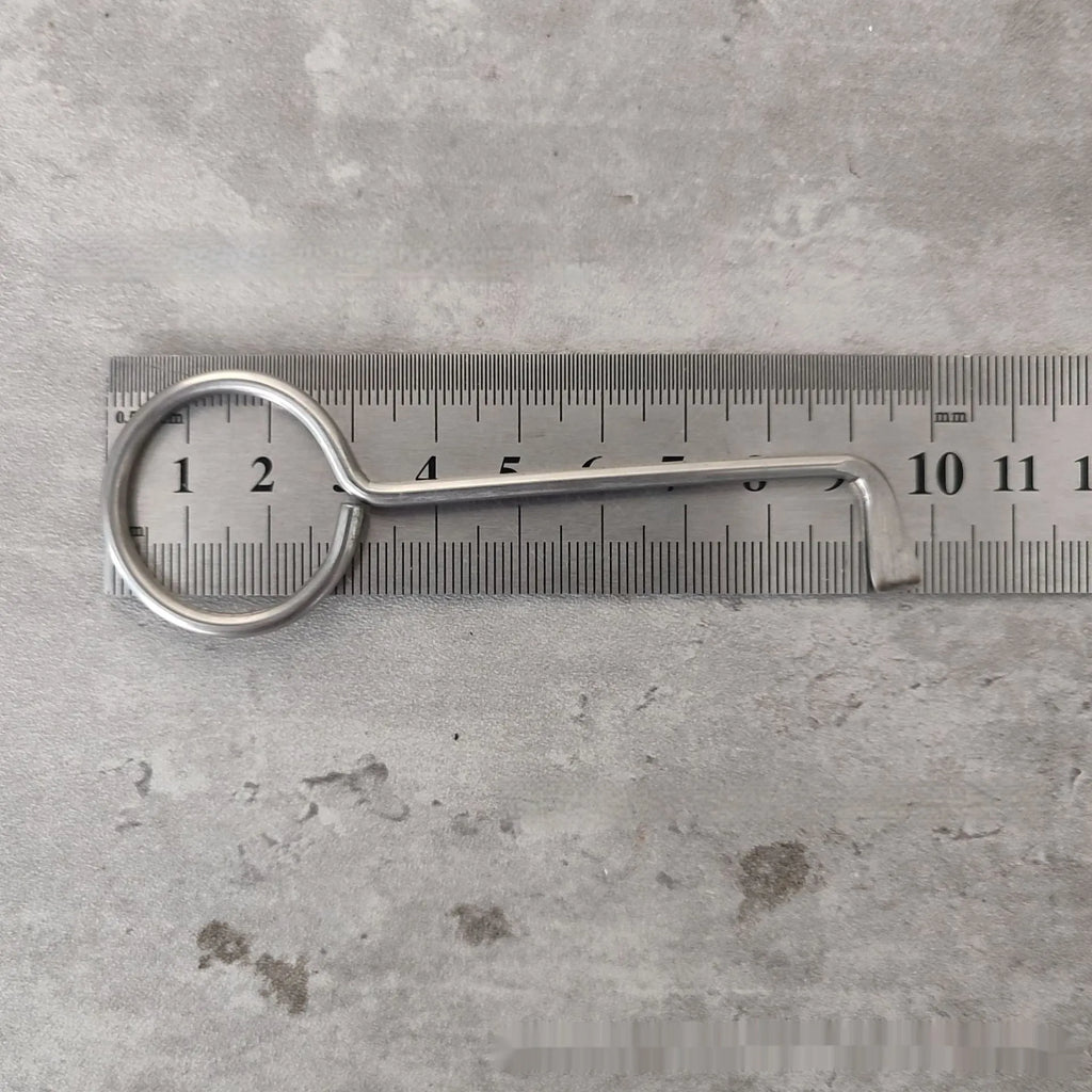 Two silver alloy universal wrench tools side by side on a surface.