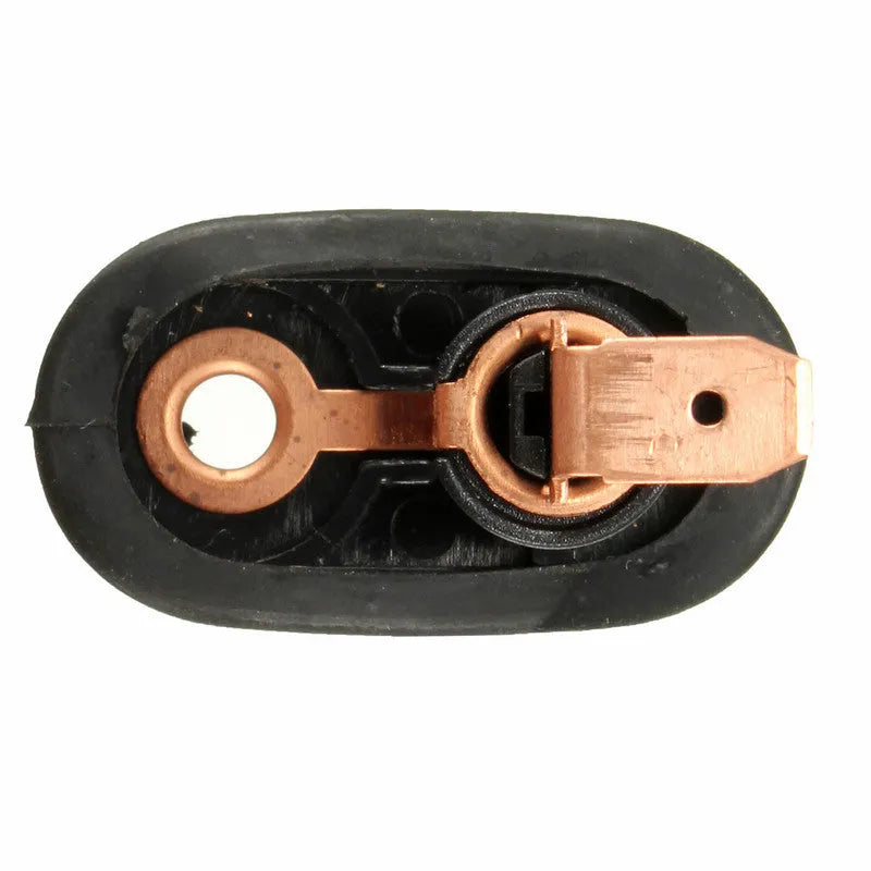 Black universal car interior door light press switch on white background.
