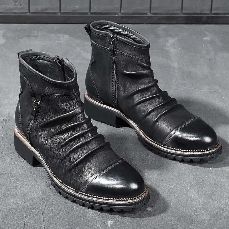 Black mid-calf cowboy boots with side zipper, round toe, and a medium horseshoe heel.