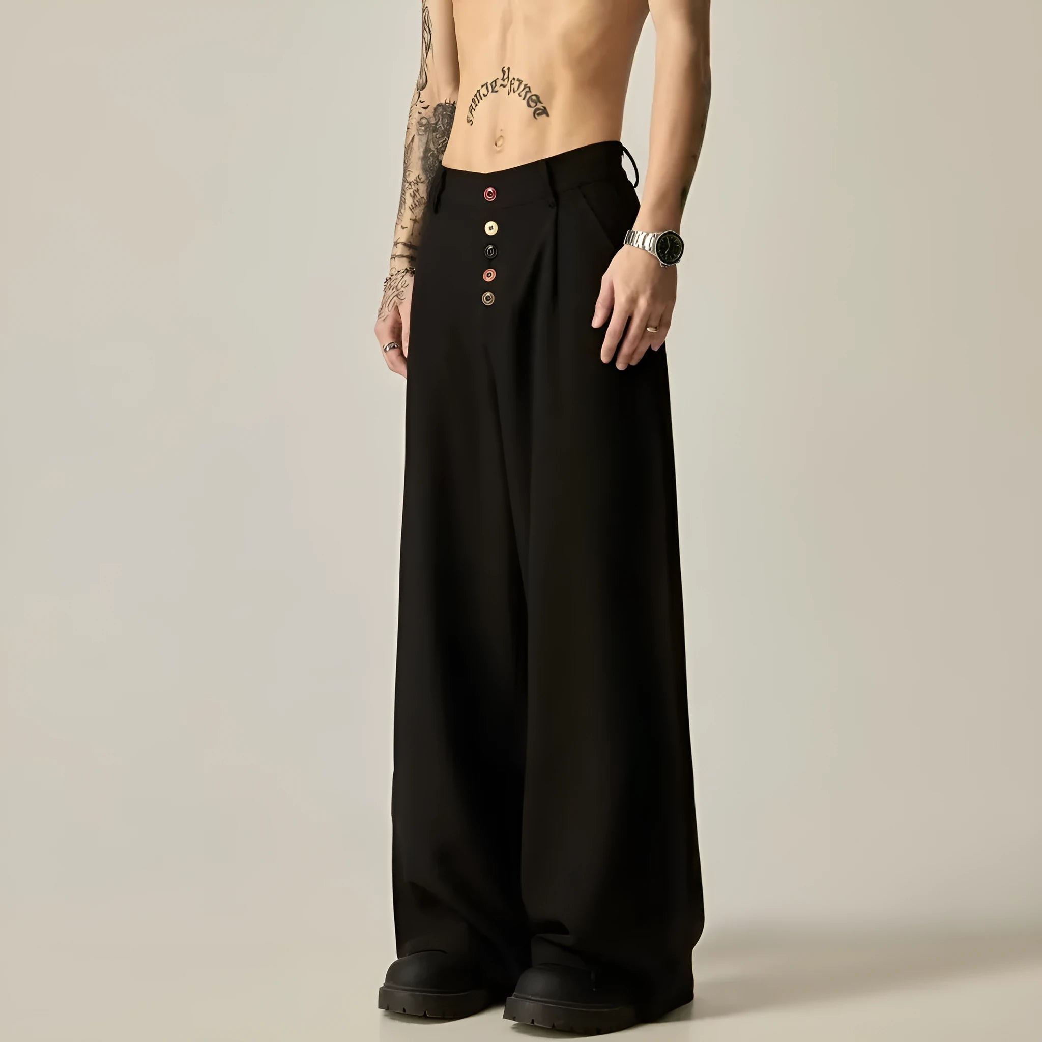 Men's solid black wide-leg casual trousers with a straight-leg cut and elasticised waist.