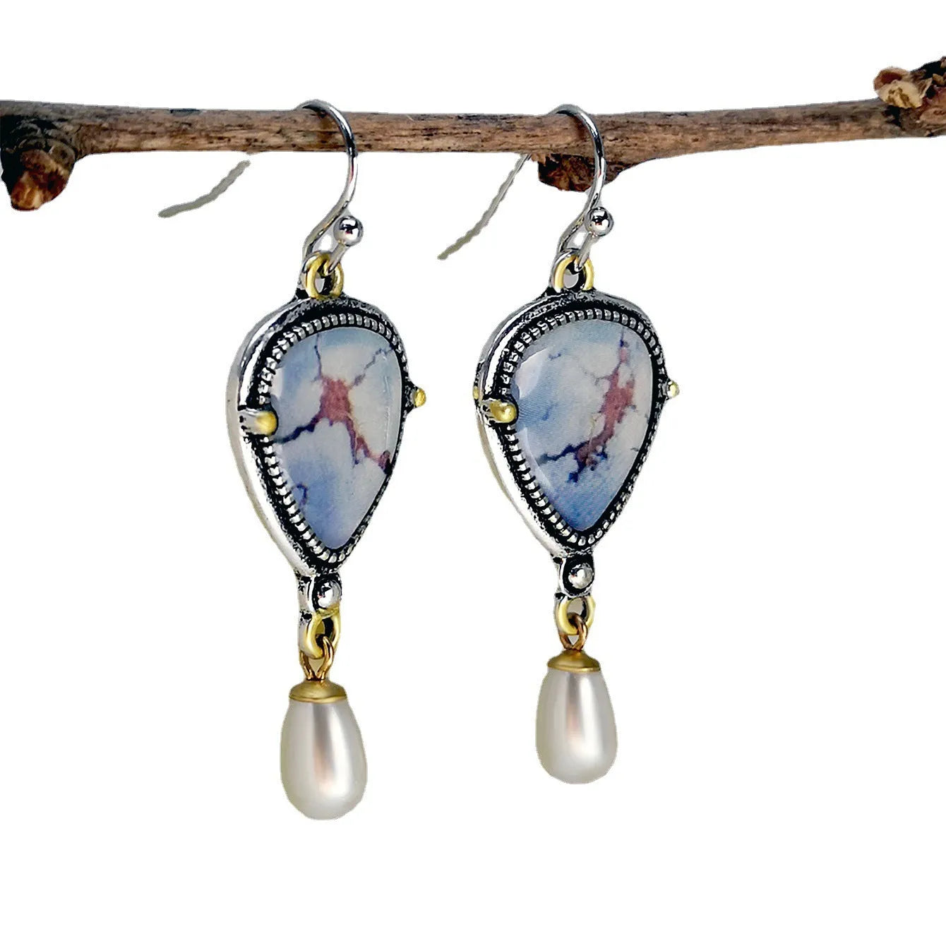 Retro blue Bohemian drop earrings with synthetic opal and pearl details on metal geometric setting