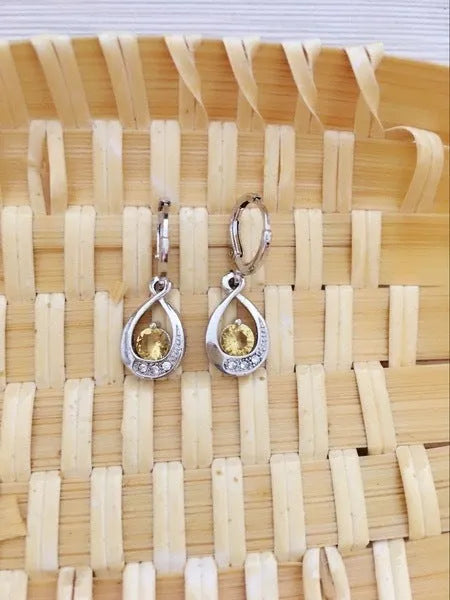 Copper water drop earrings with inlaid zircon, shown in white, yellow, red, purple, green, blue and pink