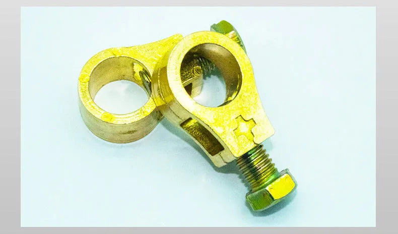 Pure copper automotive battery clamp with patented clip for terminal connection.