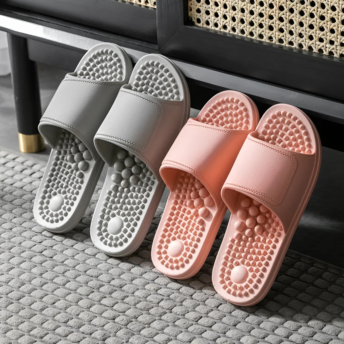 Pair of non-slip PVC massage slippers with breathable upper and wear-resistant injection-moulded sole, available in seven colours.