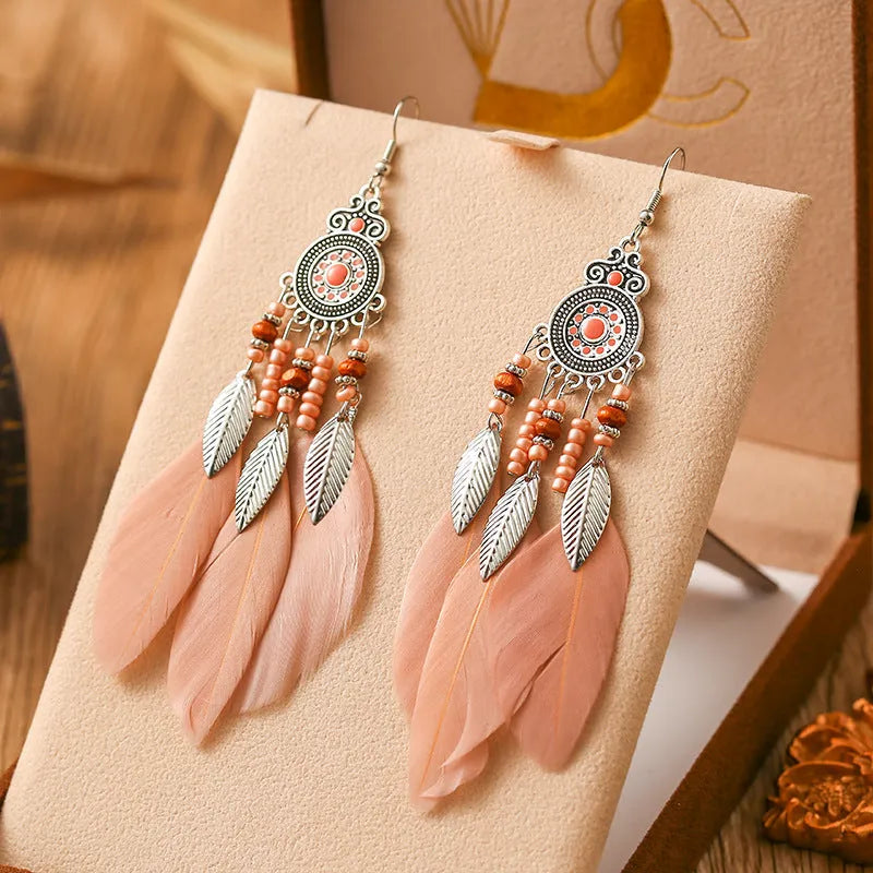 Round drop feather earrings with leaf pattern in alloy metal, available in multiple colours