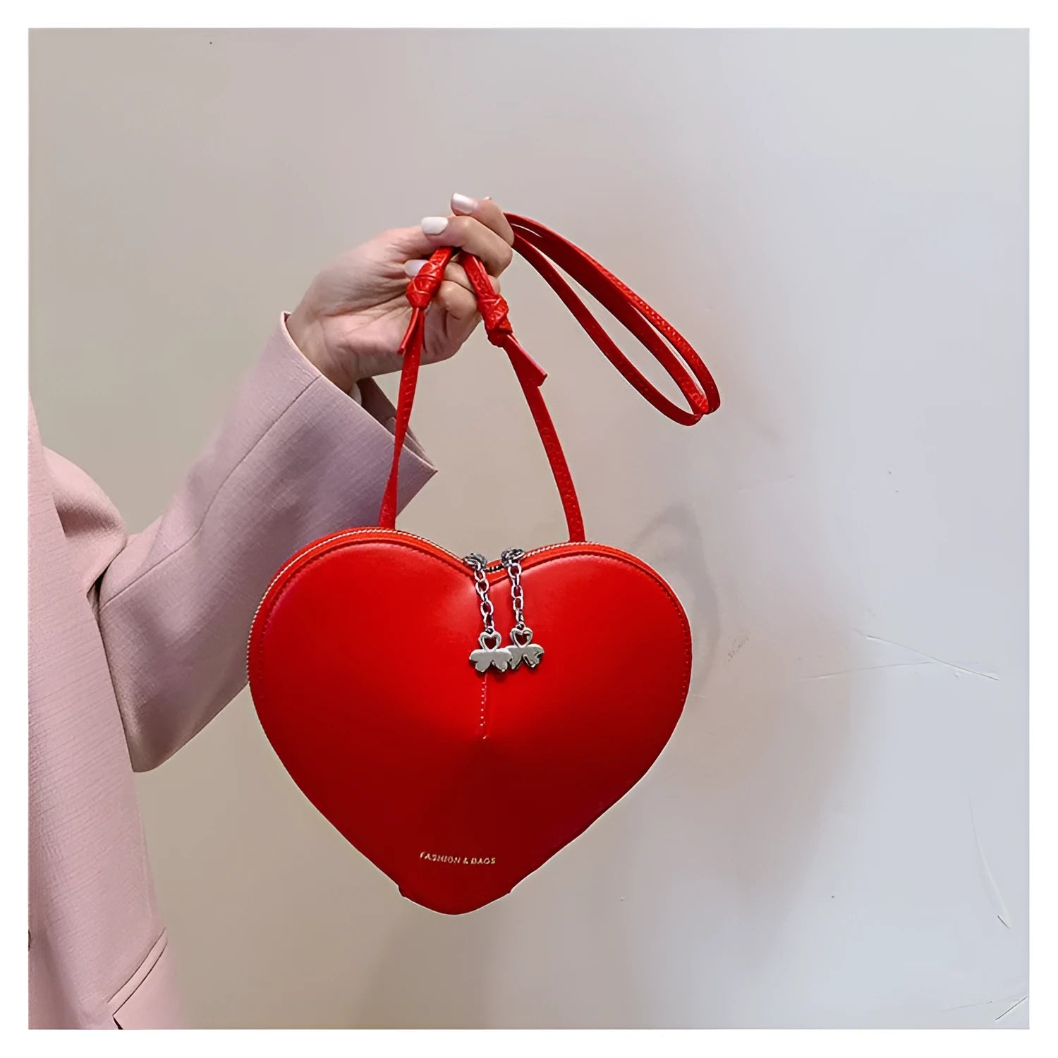 Women's PU leather heart shape crossbody bag in milky white with sewing line design and single shoulder strap