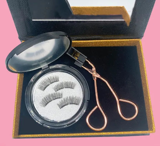Magnetic false eyelash set with soft and hard lashes and curler on white background