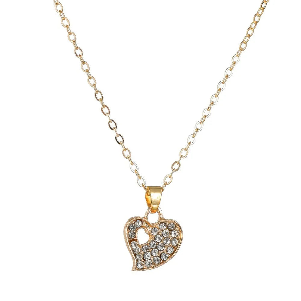 Gold electroplated women's jewellery set with love, water drop and bell pendants on adjustable chain