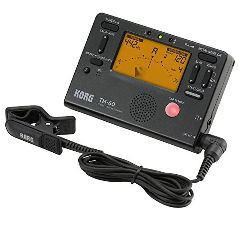 TM-60 digital metronome in black or white plastic casing with display screen and control buttons