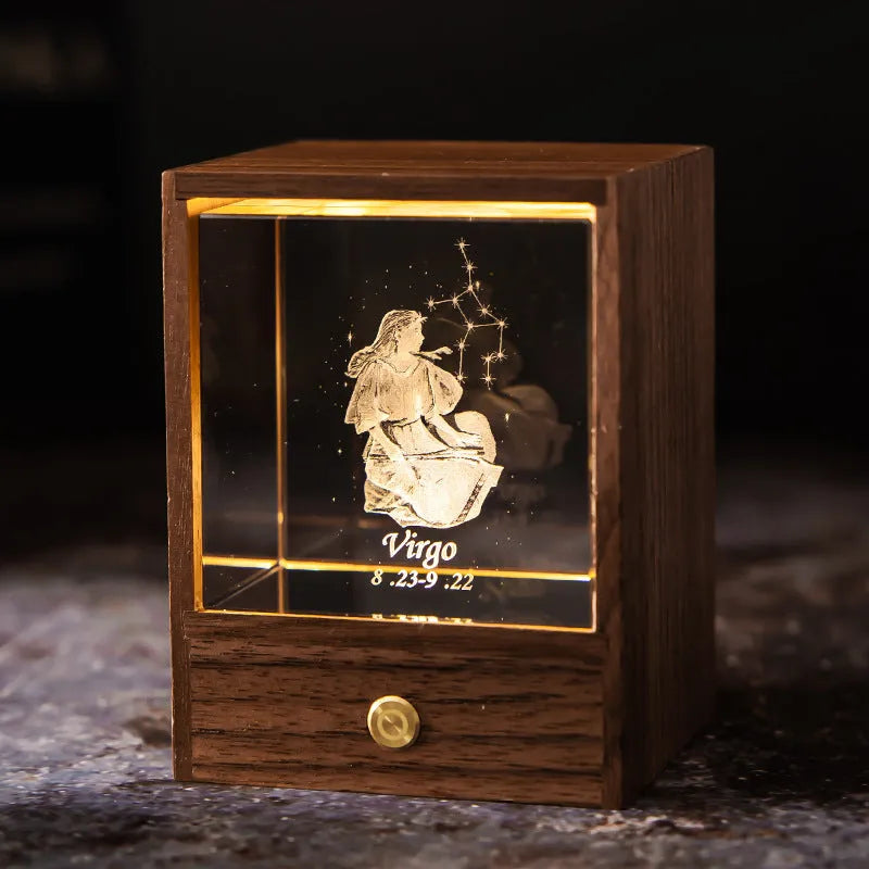 Crystal LED table lamp with black walnut base and K9 crystal showing constellation night light effect