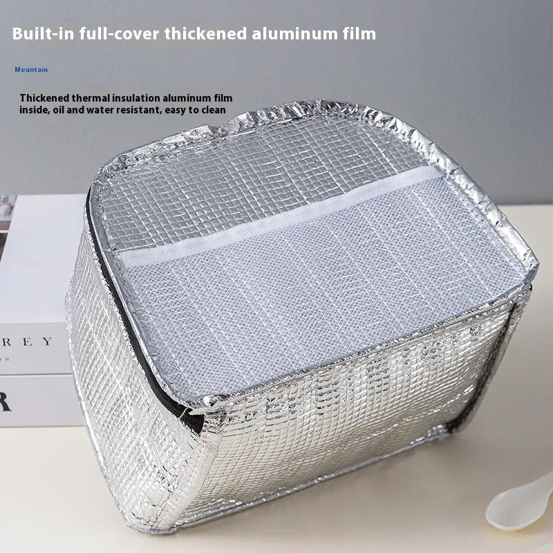 Insulated lunch box bag in textured cloth material showing colour options
