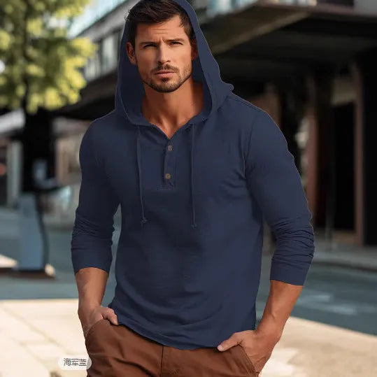 Men's dark blue cotton pullover hoodie with long sleeves laid flat.