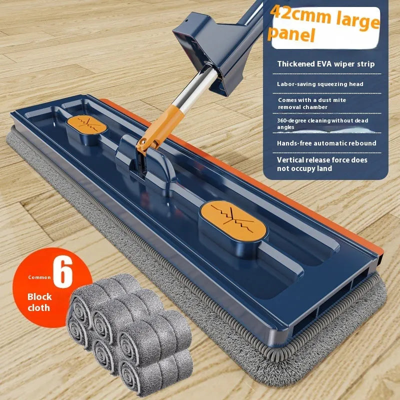 Large flat mop with stainless steel handle and blue mop cloth on hard floor