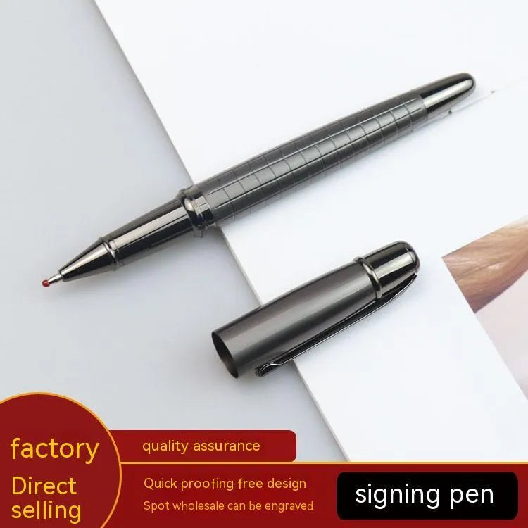 Grey metal retractable roller pen for business signatures on a white background.