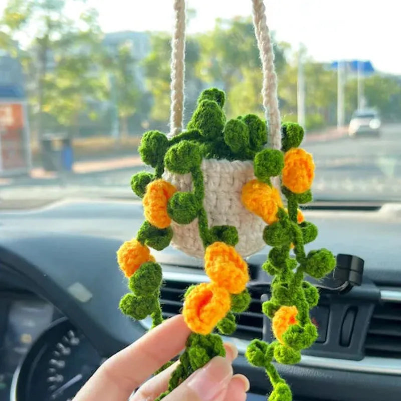 Green and white knitted car plant ornament with hanging rope for dashboard or mirror decoration