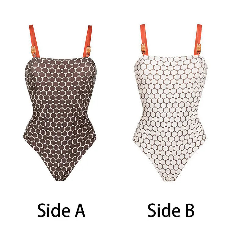 Women's polka dot print one-piece swimsuit with a matching wrap skirt on a mannequin.