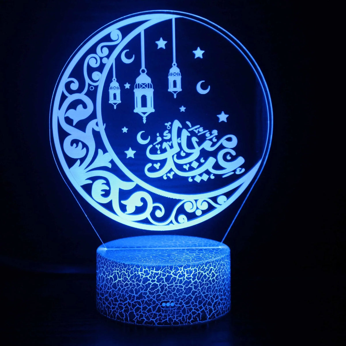 3D cartoon-style LED night lamp with black touch base, showing multiple colour changes on a bedside table.