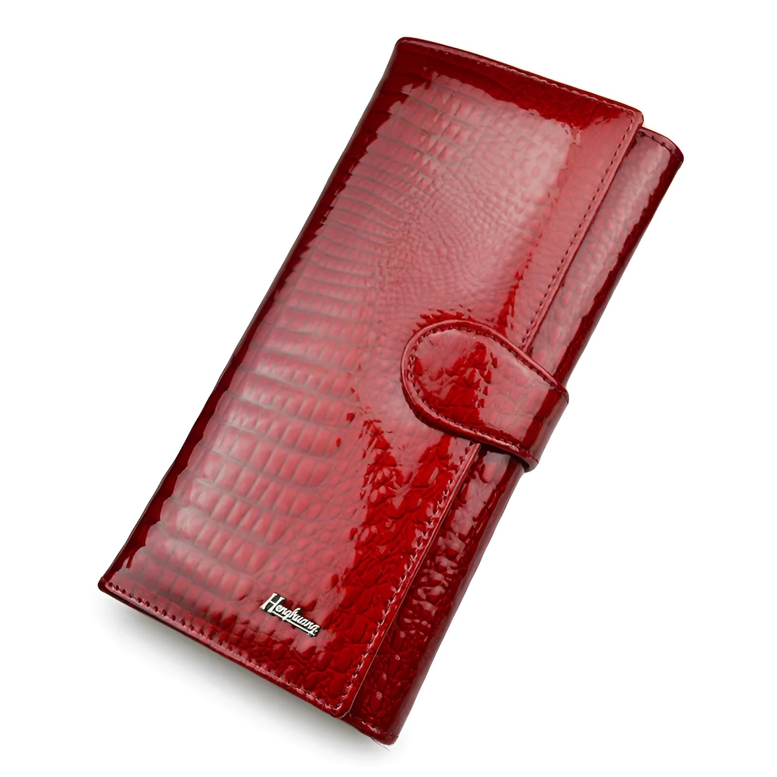 Women's red leather coin purse with crocodile pattern texture and a visible interior pigskin lining.