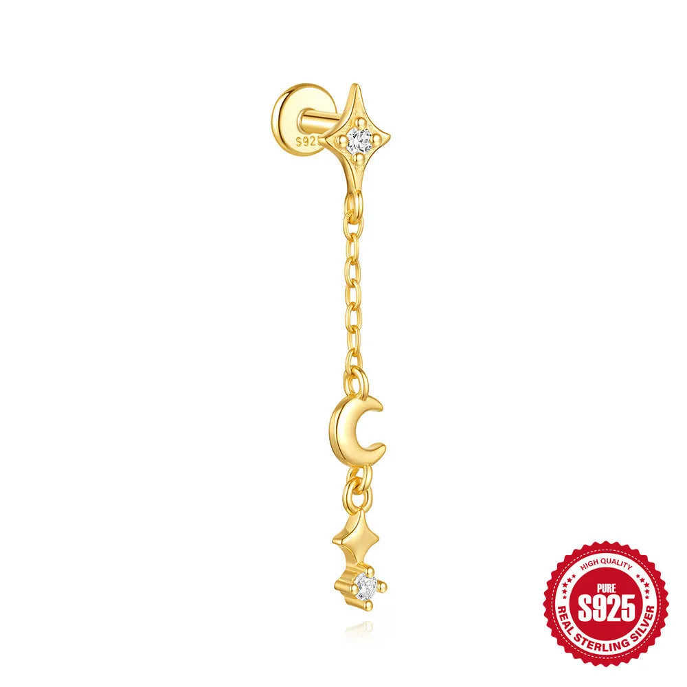 Geometric moon and star earrings in S925 sterling silver with embedded diamonds and a gold colour finish.