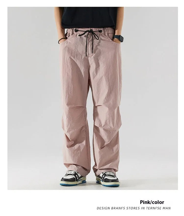Men's thin ice silk nylon trousers in straight-leg cut showing colour options including black, army green, and apricot.