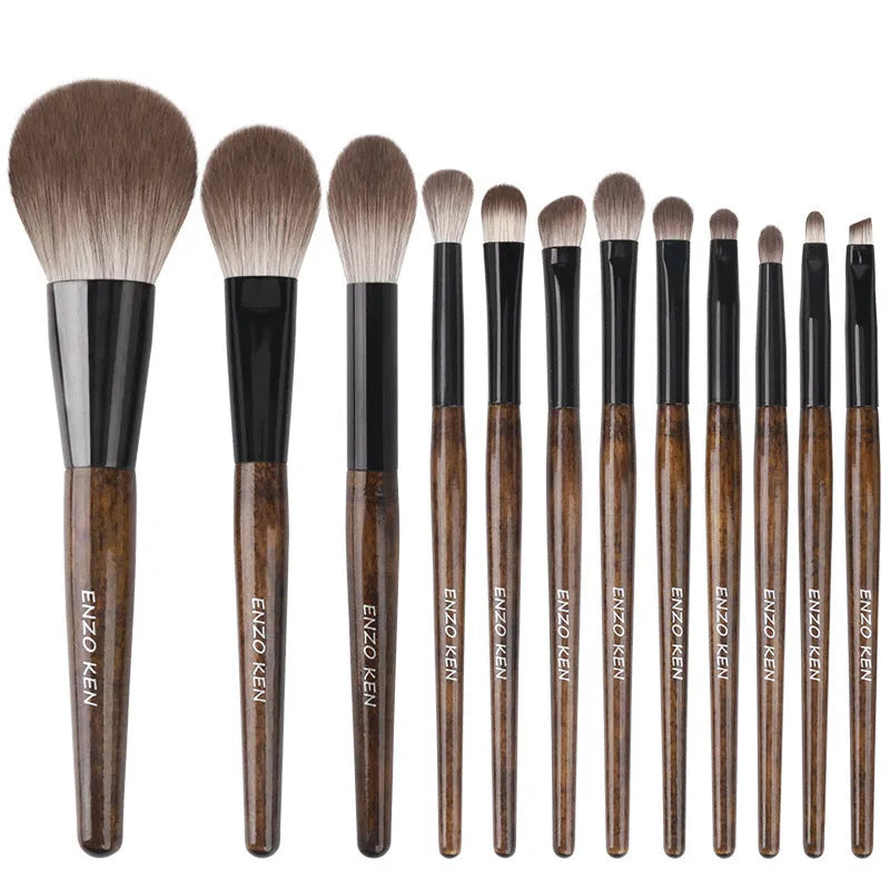12-piece makeup brush set with wooden handles in portable storage bag