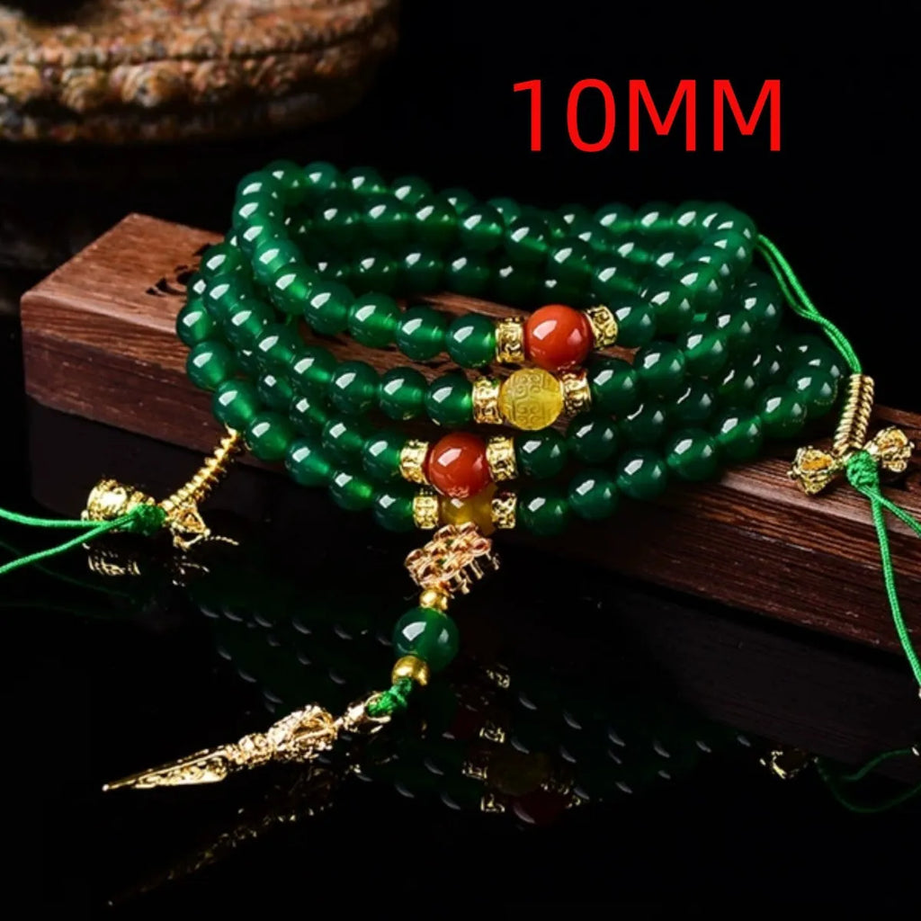 Handmade multi-strand green agate bracelet from Brazil on a wrist, showing stone sizes 6mm, 8mm, and 10mm.