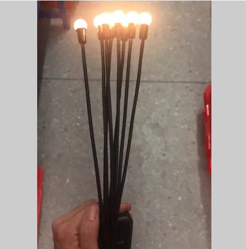 Solar-powered LED firefly ground lamp with multiple heads and ground spike for garden installation