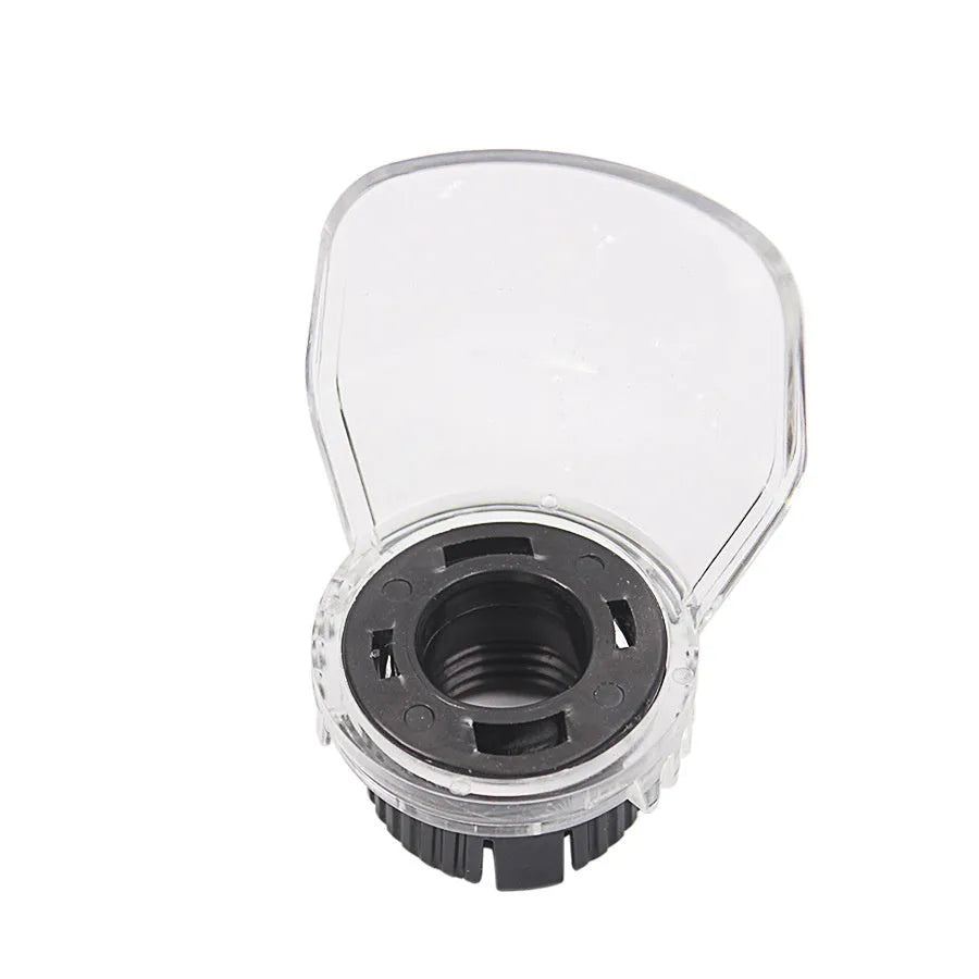 Transparent plastic horn-shaped safety cover for Delta electric grinders on a workbench.