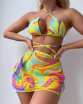 Yellow striped halter neck swimsuit set for women, showing top, skirt, and shorts with lace-up detail.