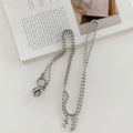 Electroplating mirror TPU phone case with animal print and attached chain for iPhone 13 Pro Max