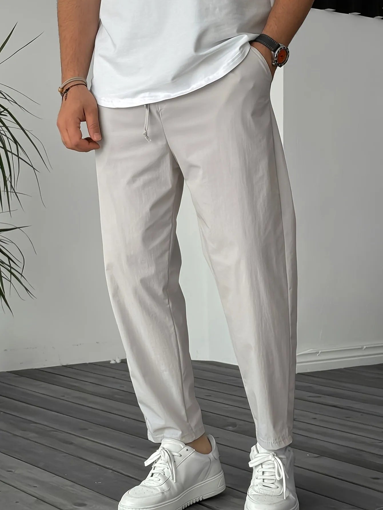 Men's straight-leg casual trousers in khaki with a drawstring waist and ribbon pocket detail