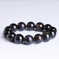 A polished crystal Pi Xiu bracelet with geometric beads on a wrist, shown in Ice Stone and Double Eye Ice Stone variants.