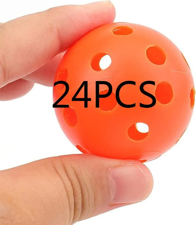 Multi-coloured golf practice balls in net storage pocket for putting training