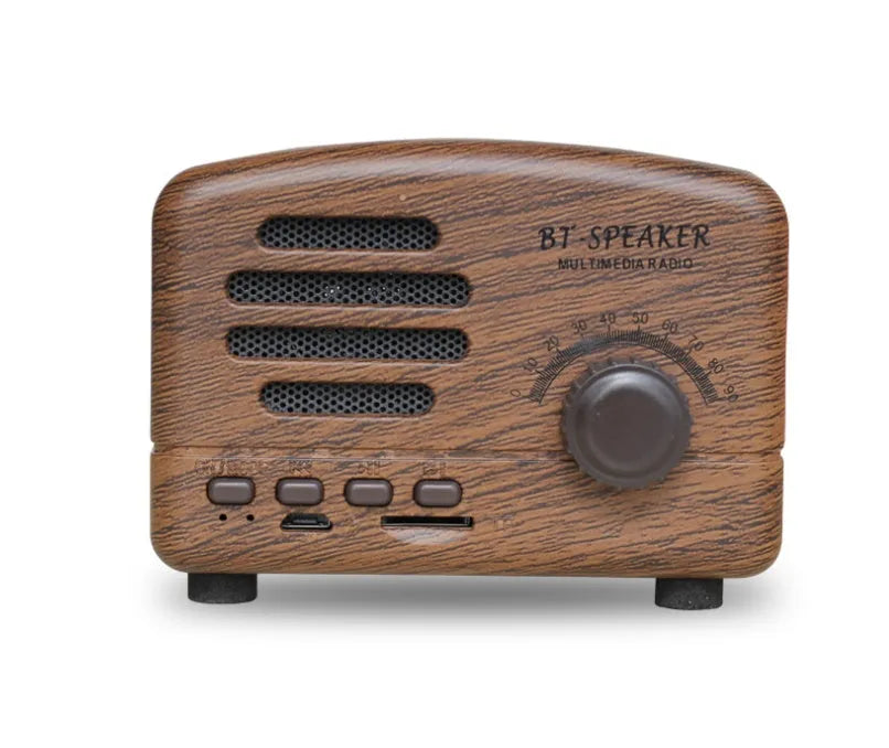 Vintage wood effect Bluetooth speaker in pink, black, and wood grain colour options showing compact 93x70x59mm size