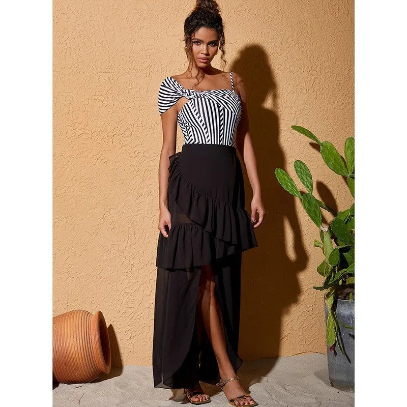 Women's striped ruffled one-piece swimsuit with removable black skirt in polyester fabric