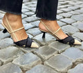 Women's apricot black colour block stiletto heel sandals with pointed toe and buckle.
