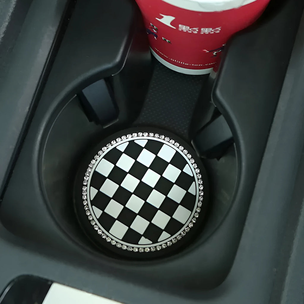 PVC plastic car cup holder mat coaster in black and white checkerboard pattern.