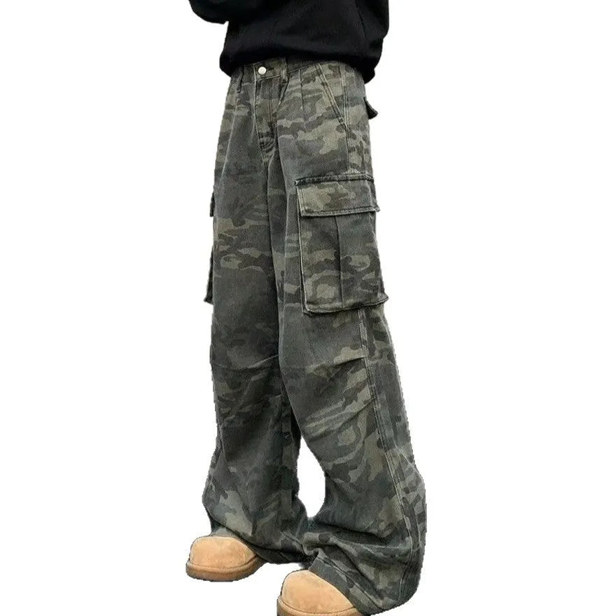 Vintage washed camouflage pattern cargo trousers with multiple pockets on a mid-waist fit.
