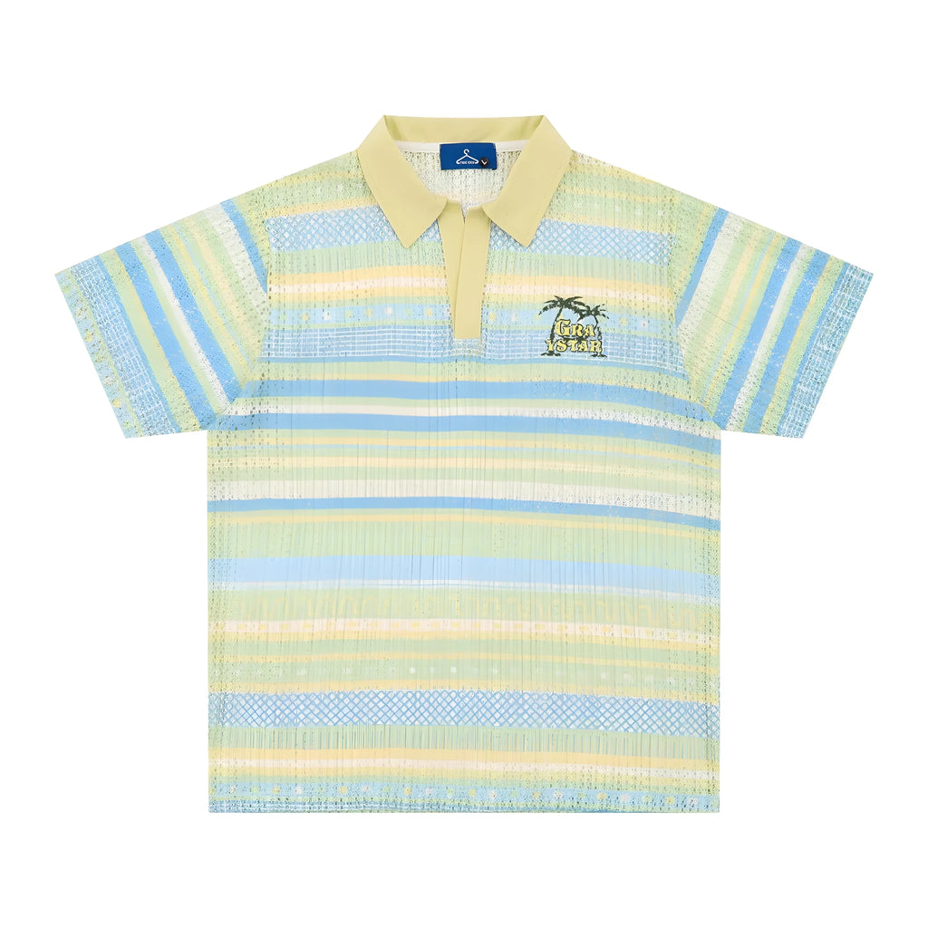 Man wearing a blue printed short sleeve shirt with a loose casual fit.