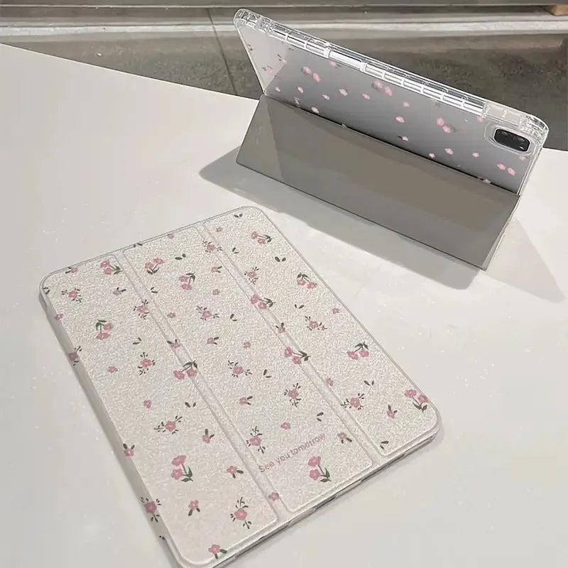 Transparent floral tri-fold iPad case with magnetic kickstand open in viewing position