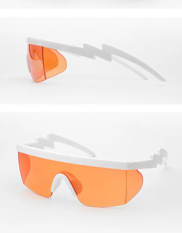 Sports sunglasses with colourful lens film, black half-frame, and curved foot piece for active outdoor use
