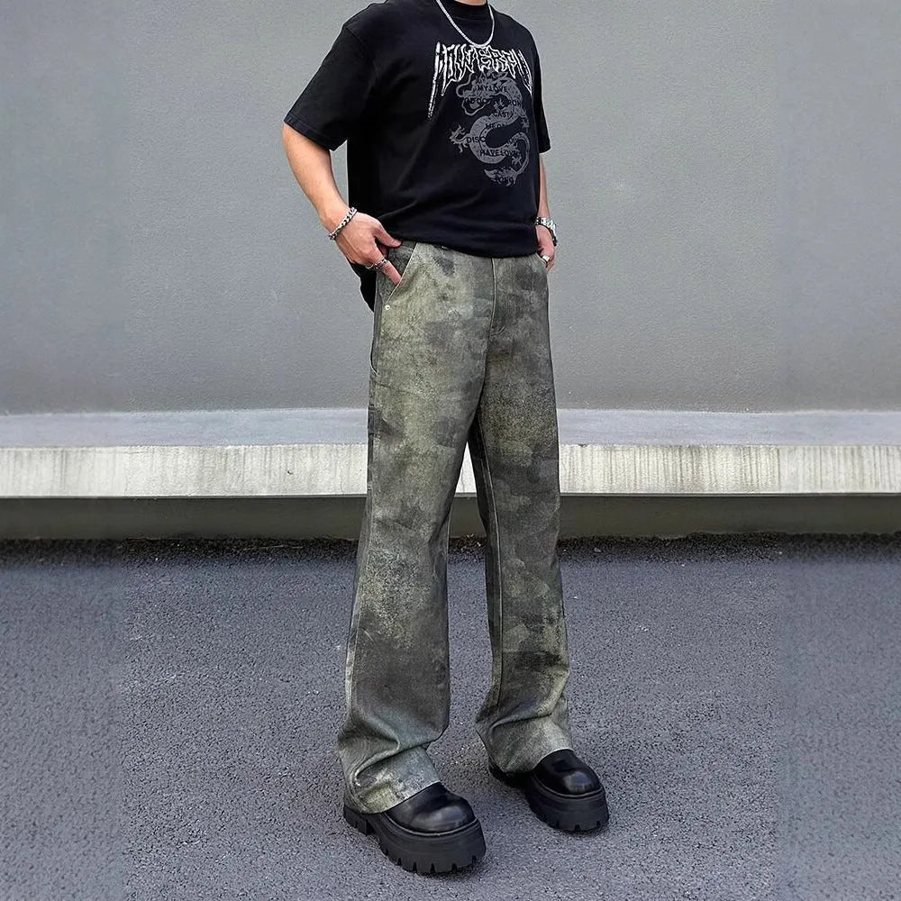 Men's straight-leg denim jeans featuring a digital camouflage pattern in picture colour.