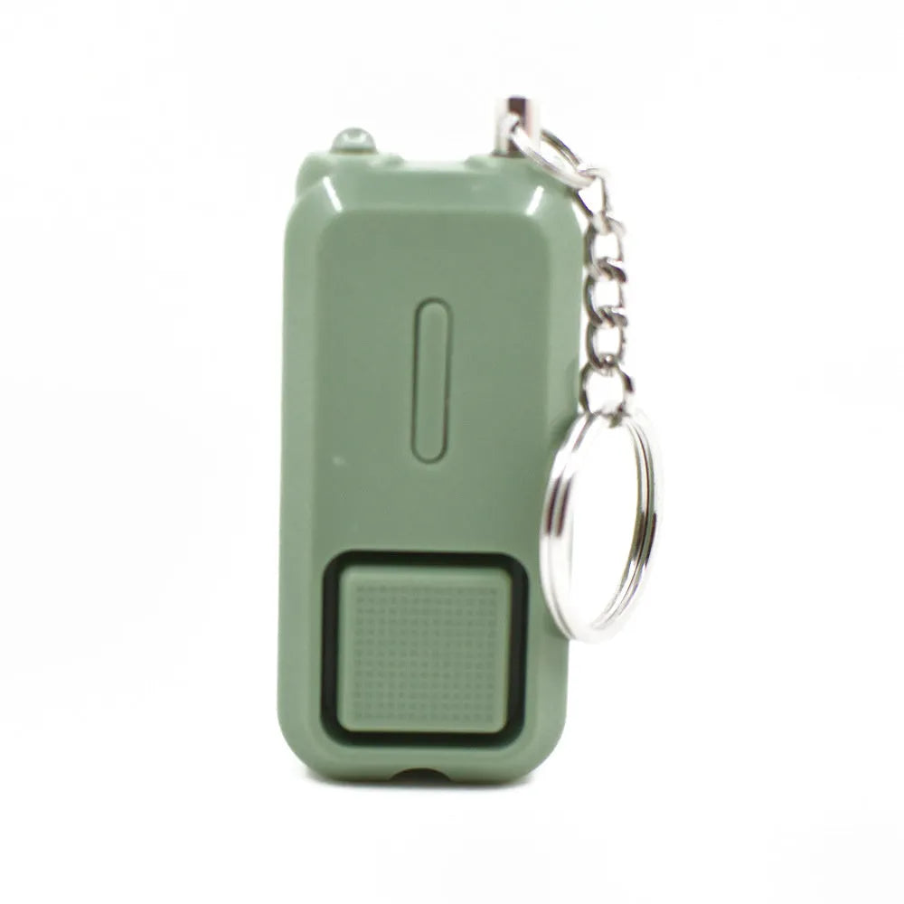 ZQ-202 personal safety alarm in pink colour showing compact 65x30x12mm dimensions