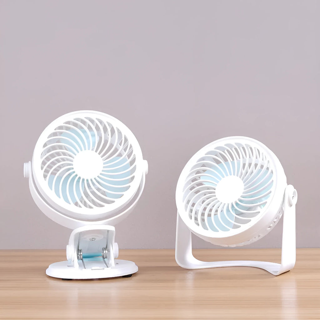Small USB desktop fan in white plastic with three blades, shown as both clip-mounted and floor-standing versions