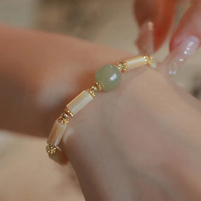 Women's Hetian jade bracelet with geometric round beads in simple design