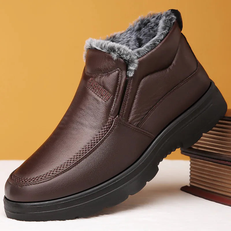 Black and brown fleece-lined men's winter slip-on shoes with a waterproof PU upper and rubber sole.