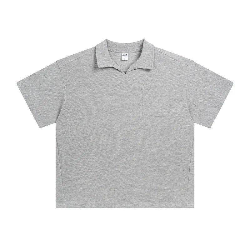 Cotton loose-fit drop-shoulder short sleeve top in Paris forest green, front view, with simple lapel neckline