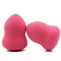 Pink cubic makeup sponge for foundation application, shown with dimensions 4cm by 4cm by 5.6cm.