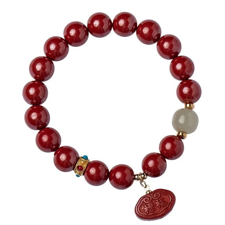 Red cinnabar bracelet with emperor sandstone carving featuring Ping An Fu Lu characters